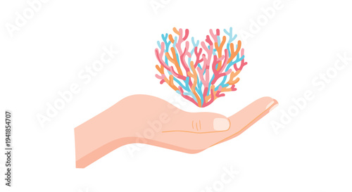 A light-skinned hand with an open palm gently supports a vibrant, multi-colored heart shape constructed from abstract coral-like branches floating above it.