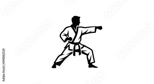 A man in a fighting stance with a black background