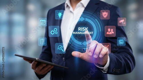 A visionary business leader leveraging cutting-edge digital technology and holographic interfaces to strategically implement robust risk management solutions