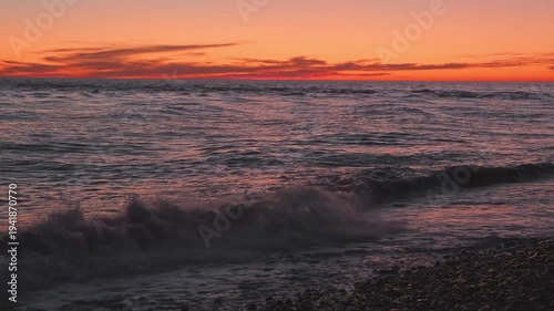 sea surf on coast at sunset, slow motion
