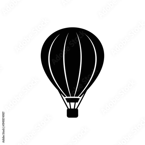 Silhouette of a hot air balloon in flight.