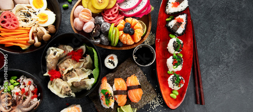 Wallpaper Mural Table served with sushi and traditional japanese food. Torontodigital.ca