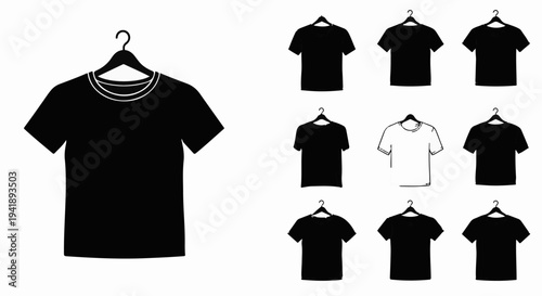 A collection of plain t-shirts, displayed on hangers, in black and white