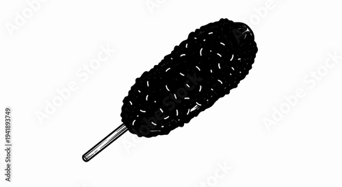 A black, textured food item on a stick, with small white marks