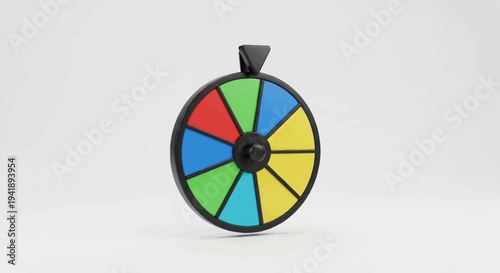 A colorful spinning wheel with black edges and a black spinner sits on a white background