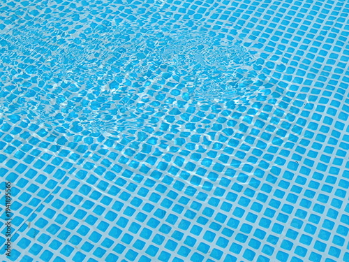 Foto Rippling clear water in a blue swimming pool
