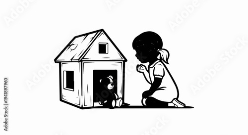 A child kneels beside a simple house, offering a toy bear inside