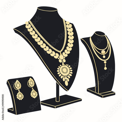 Gold jewelry display with necklaces and earrings on black stands
