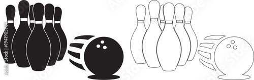 Black and white bowling ball and pins in motion