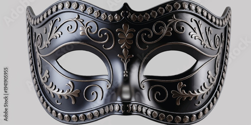 A detailed photograph of an ornate Venetian-style mask in matte black 
