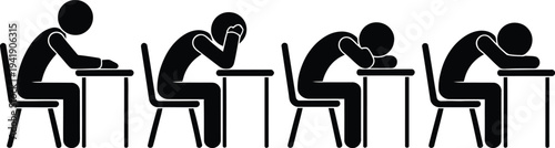 Four individuals sitting at desks with their heads down, possibly sleeping or resting