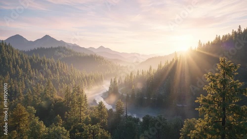 Sunrise Over Mountain Forest Landscape with Mist and Sun Rays.
