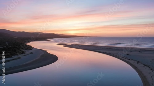 Serene Sunset Over Calm River with Vibrant Sky.