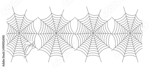 A horizontal line of stylized, grey spiderwebs on a white background