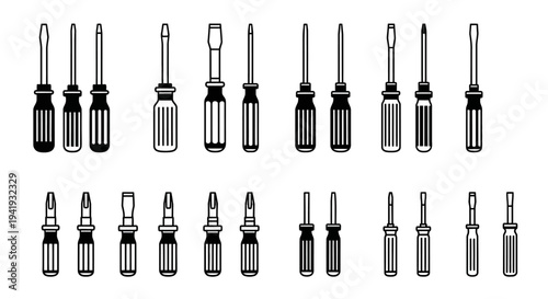 Assorted screwdrivers arranged neatly in two rows on a plain white background from a directly overhead viewpoint