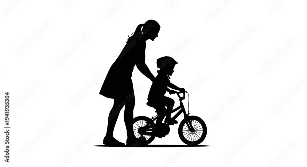 Obraz premium Mother teaching daughter to ride a bicycle silhouette.