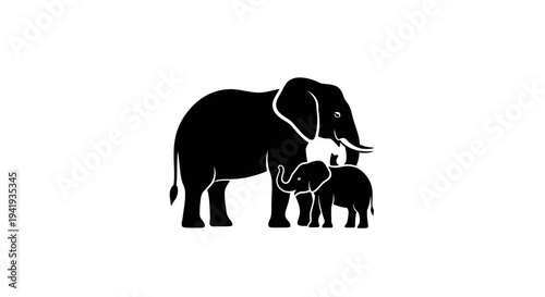 Silhouette of an adult elephant and its calf standing together.