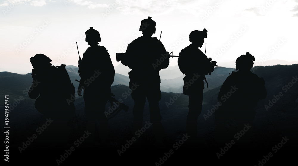 Fototapeta premium Military personnel stand together during conflict in Iran near mountainous area at sunset