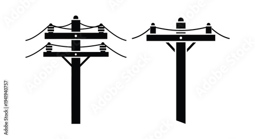 Two electrical power pylons displayed as a stark black silhouette