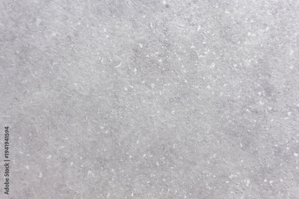 Fototapeta premium Textured background of smooth light gray surface with subtle patterns and details visible