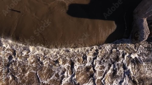 Aerial Drone View of Spring Waterfall and Rapid River Flow During Snowmelt in Paris Ontario Canada