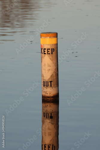 Danger Do Not Enter Buoy Floating in Water Warning Sign