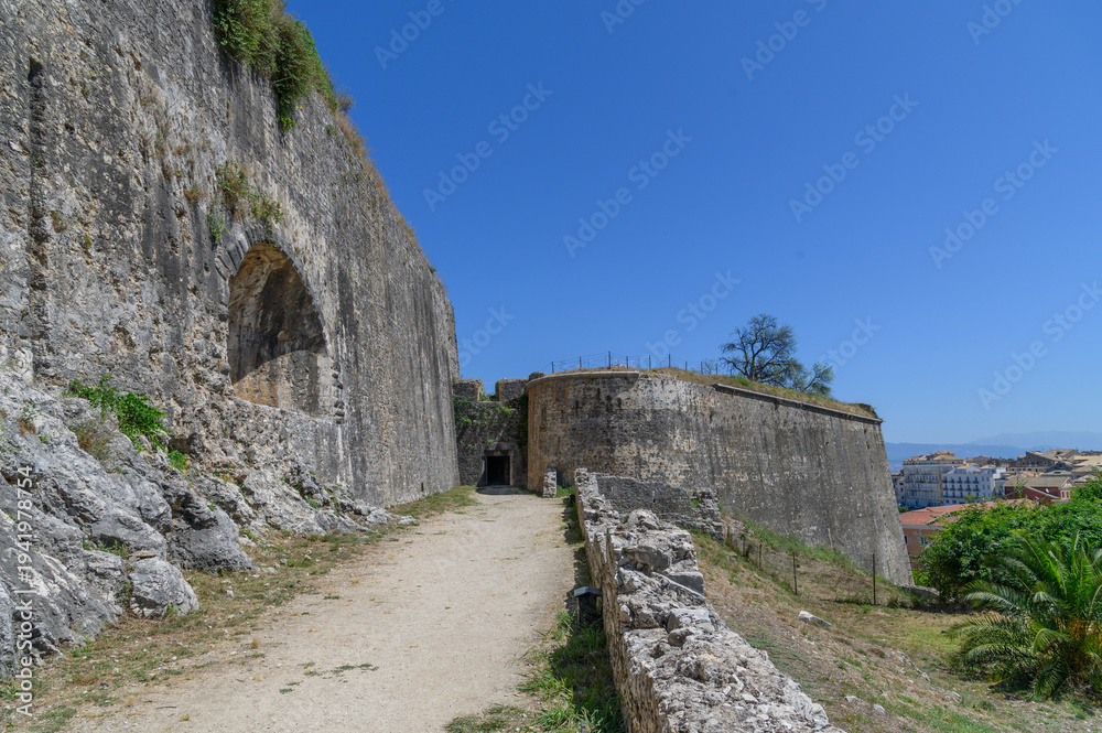 Fototapeta premium Fortress Gate and Rocky Slope in Corfu, Greece