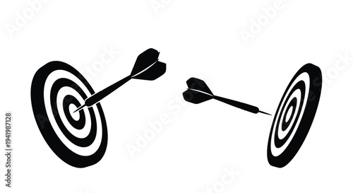 Darts in flight striking target boards a striking black silhouette