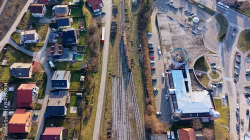 Aerial view train passing through town