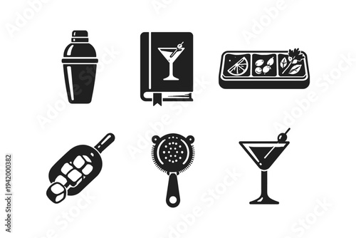 Collection of bar tools and cocktail garnishes for making drinks