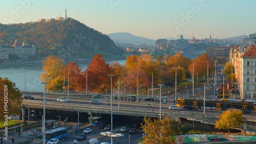 Panoramic view of Budapest and Danube River, city architecture, bridges and road traffic