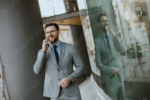 Businessman talking on phon...