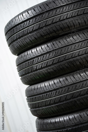 A stack of new car tires