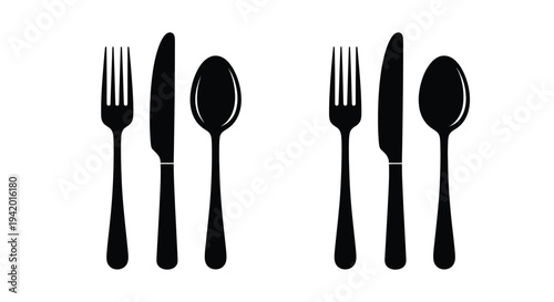 Black flatware arrangement depicting forks knives and spoons silhouette