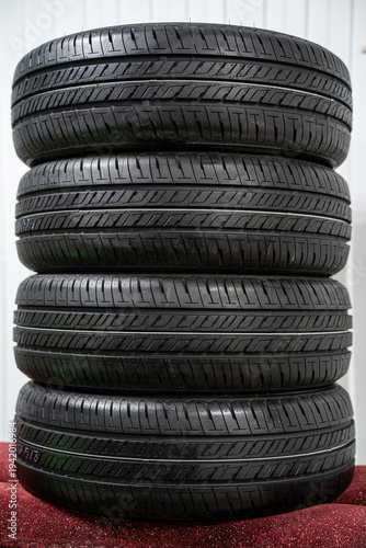 A stack of new car tires