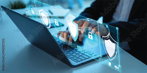 Hands typing on laptop with holographic digital network and shield overlay, signifying cybersecurity and information protection, data protection, online security