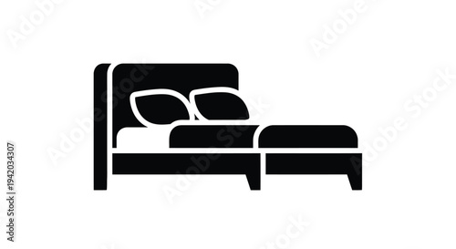 Simple bed design with pillows shown in a dark silhouette