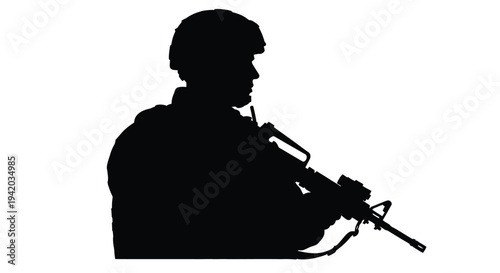 Soldier holding rifle in a stark black profile silhouette