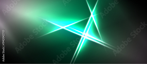 Abstract green light flares intersect. Bright starburst effect dominates dark background. Smooth gradients create depth, energy.
