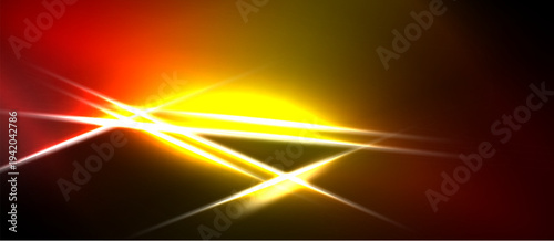 Bright light streaks radiate from central yellow glow. Red, orange hues dominate dark background. Dynamic energy visible.