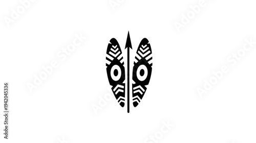A symmetrical black and white illustration of a stylized tribal mask and spear on white background