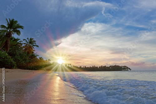 Colorful sunset on tropical beach. Travel background.