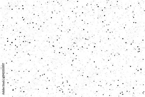 A subtle yet impactful array of dark granular elements on a bright clear base generating a distinct surface