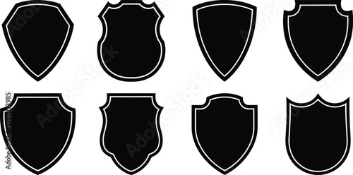 Collection of eight blank black security shield silhouettes with inner outline borders, ideal for designing law enforcement badges or protective emblems.