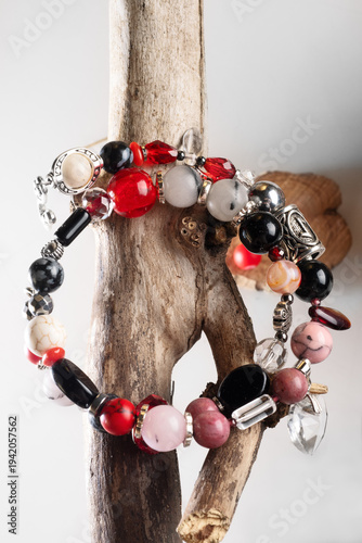 different   bracelets with black and red  semipreciouse stones with natural lava, shungite,  hematite,  rhodonite, coral  and others.  top view