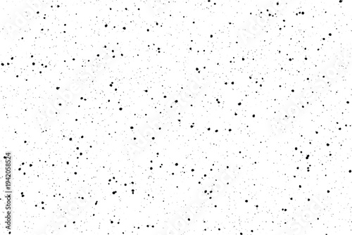 Scattered black dots form a random noise pattern across a pristine bright white field
