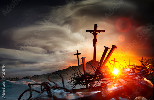 Crucifixion Calvary - Crown Of Thorns And Bloody Nails At Dramatic Sunset With Crosses On Hill - Sunbeam Effects