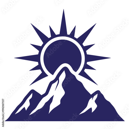 Mountain range landscape with sun rising behind peaks in blue silhouette  serene natural scenery