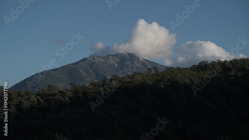 Timelapse video showing clouds forming and disappearing in a mountain landscape.