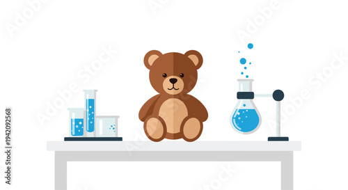 A brown teddy bear is seated on a light grey table, positioned between multiple test tubes and a bubbling flask containing blue liquid.